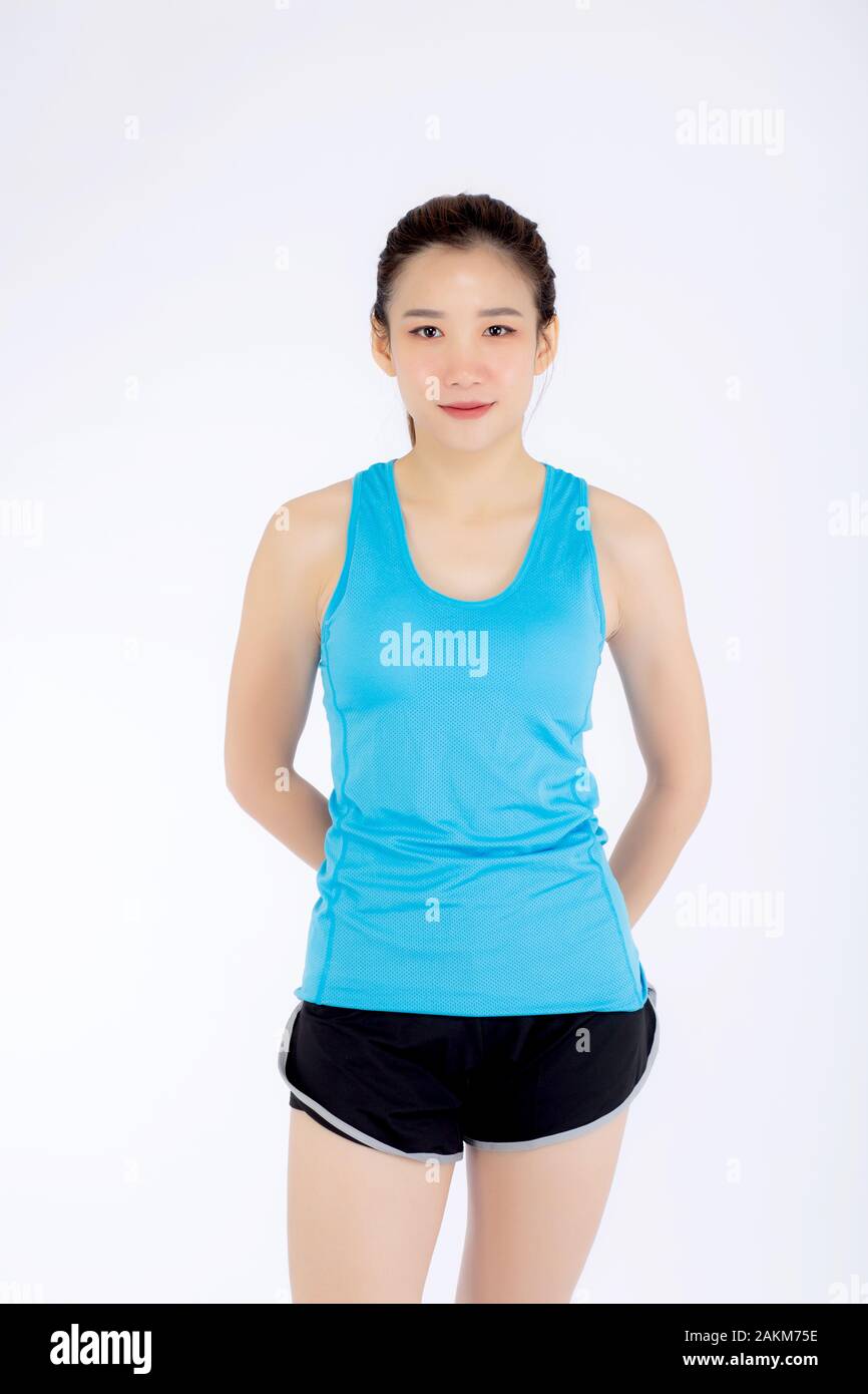 Schöne portrait junge asiatische Frau im Sport Kleidung mit zufrieden und zuversichtlich auf weißem Hintergrund, Mädchen Asien haben ihre Form und Wellness, e Stockfoto