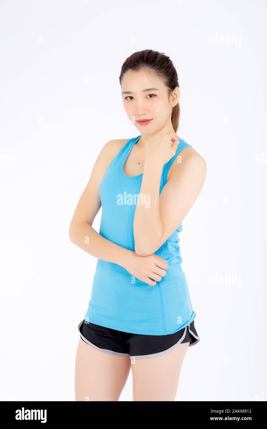 Schöne portrait junge asiatische Frau im Sport Kleidung mit zufrieden und zuversichtlich auf weißem Hintergrund, Mädchen Asien haben ihre Form und Wellness, e Stockfoto