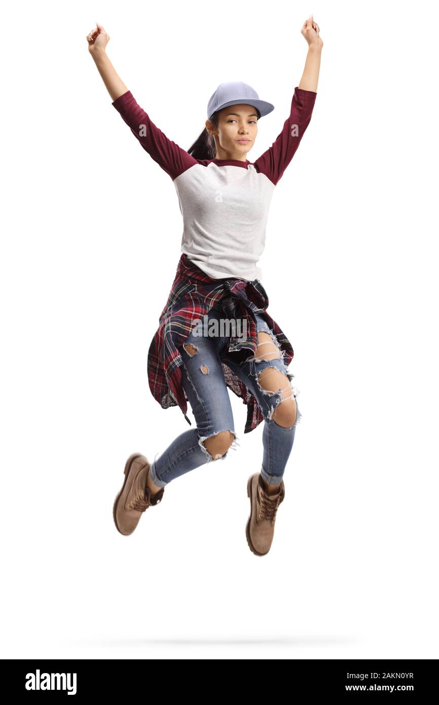 In voller Länge Porträt einer jungen Frau springen mit erhobenen Armen auf weißem Hintergrund Stockfoto