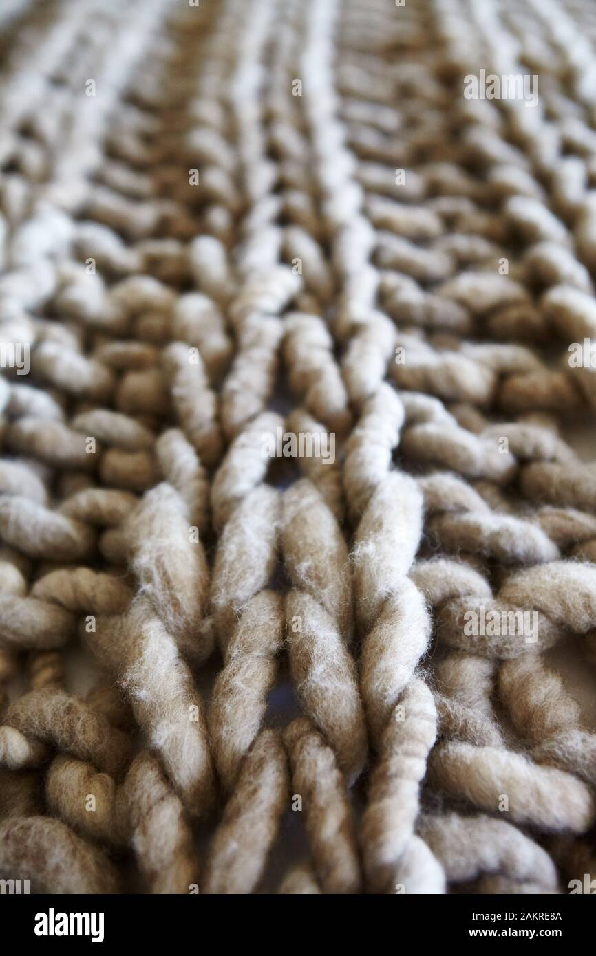 Klobiger Strickwurf Stockfoto
