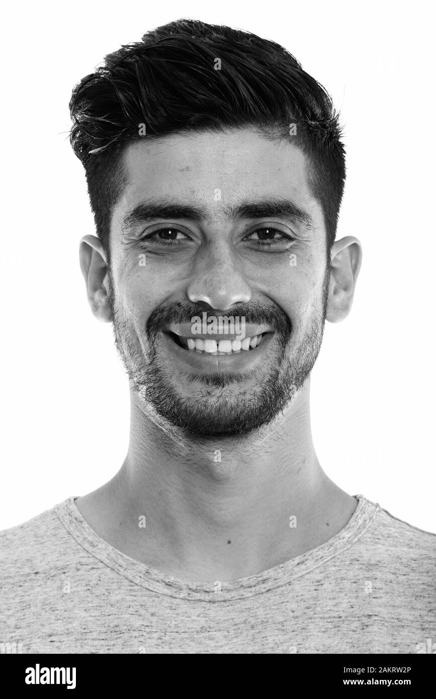 Gesicht der Jungen glücklich Persischen Mann lächelnd Stockfoto