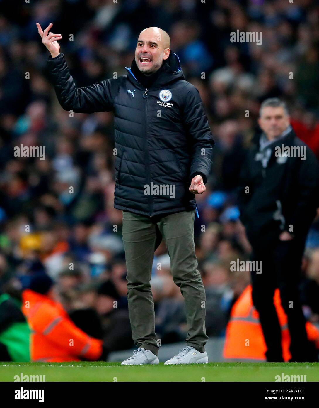 Manchester City Manager Pep Guardiola Gesten auf dem touchline während der FA Cup in der dritten Runde an der Etihad Stadium, Manchester. Stockfoto Manchester City Manager Pep Guardiola Gesten auf dem touchline während der FA Cup in der dritten Runde an der Etihad Stadium, Manchester. Stockfoto