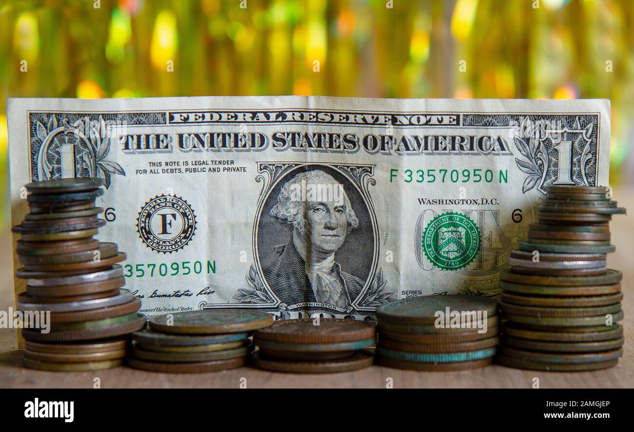 Dollar und Münzen Stockfoto