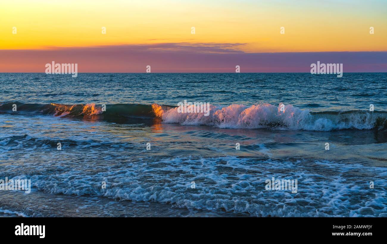 Strand in Sonnenuntergang Stockfoto