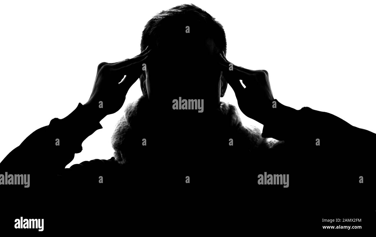 Silhouette von männlichen Reibtempeln, die an Migräne leiden, Kopfschmerzbehandlung Stockfoto