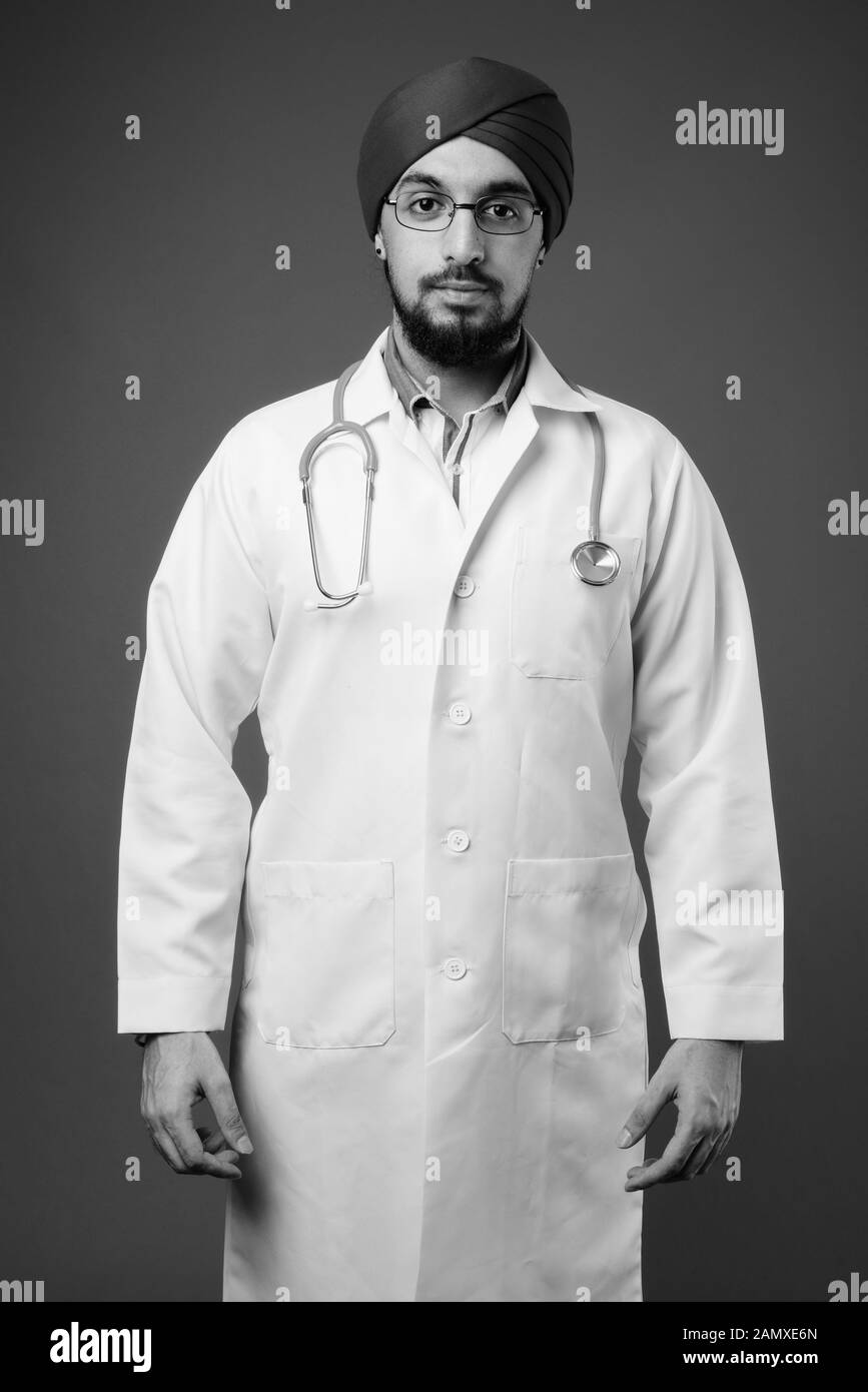 Junge Bartgeier indischen Sikh Mann, Doktor, tragen Turban Stockfoto
