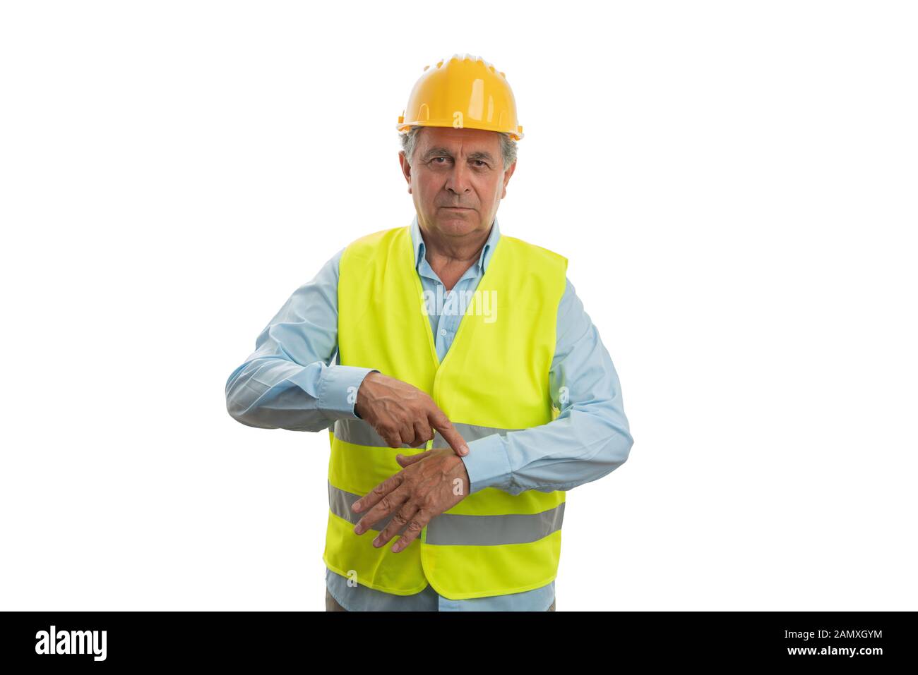 Wütend männlichen Builder zeigen am Handgelenk mit Index Finger, wie Sie sind spät Konzept auf weißem studio Hintergrund isoliert Stockfoto