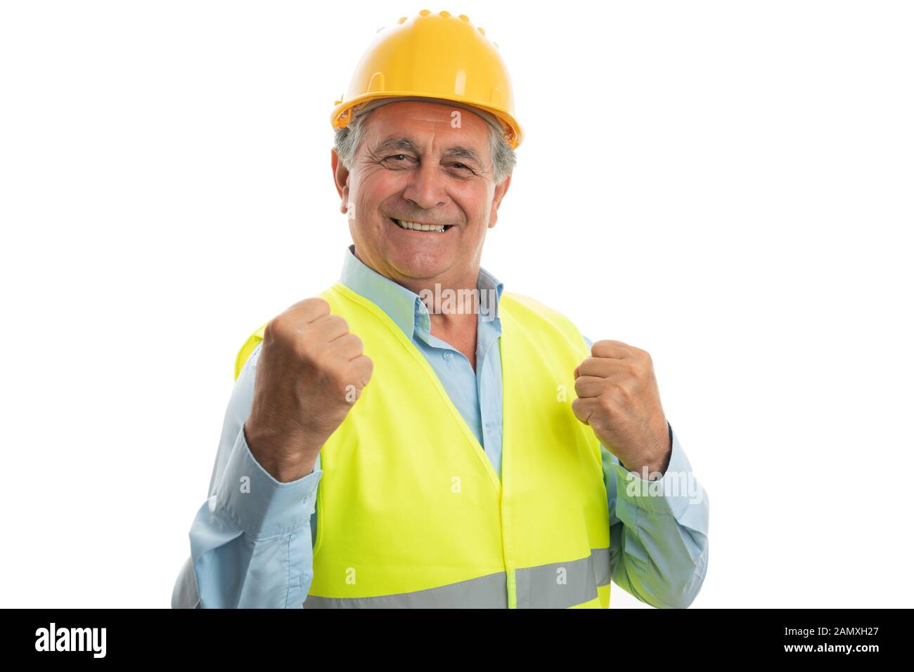 Fröhlichen alten männlichen Bauarbeiter machen glücklich Geste mit Fäusten wie feiern Konzept isoliert auf weißem Stockfoto