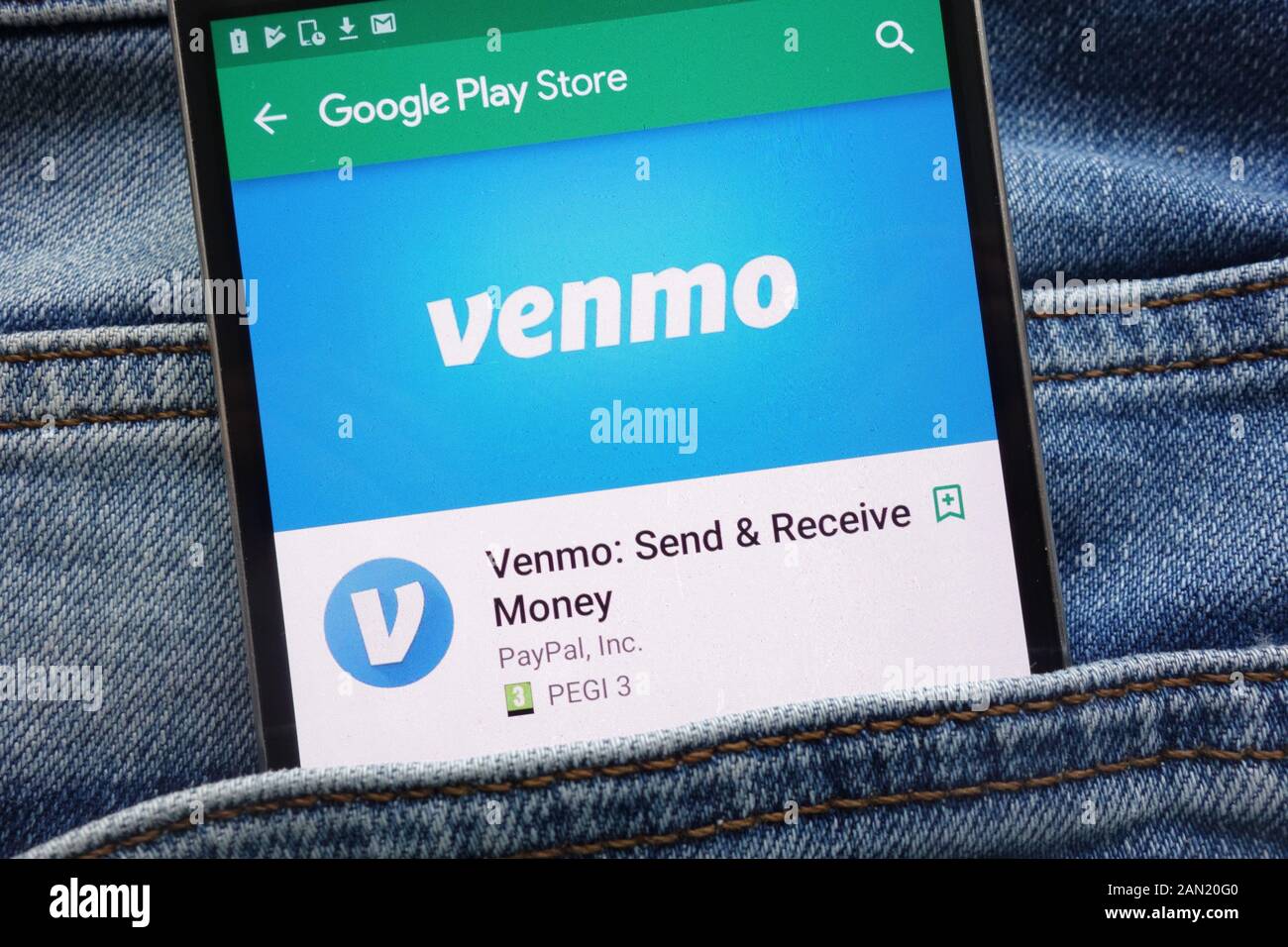 Venmo App bei Google Website spielen Store angezeigt auf dem Smartphone in Jeans Tasche versteckt Stockfoto