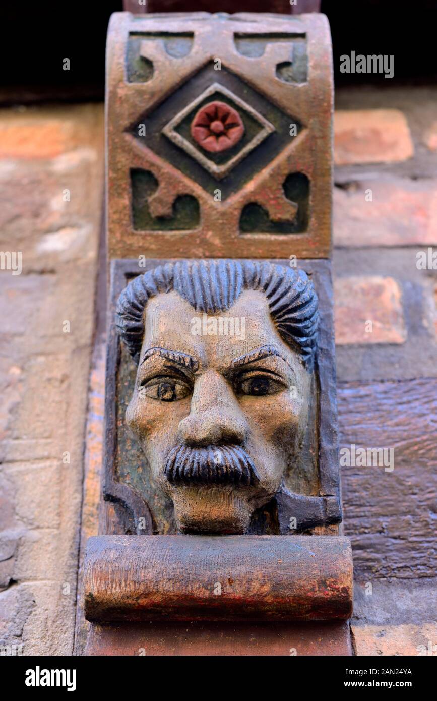 Geschnitzten Gesichts auf Holzbalken von Hans Raffns Haus aus dem Mittelalter, Angel House in Ystad, Scania, Schweden Stockfoto