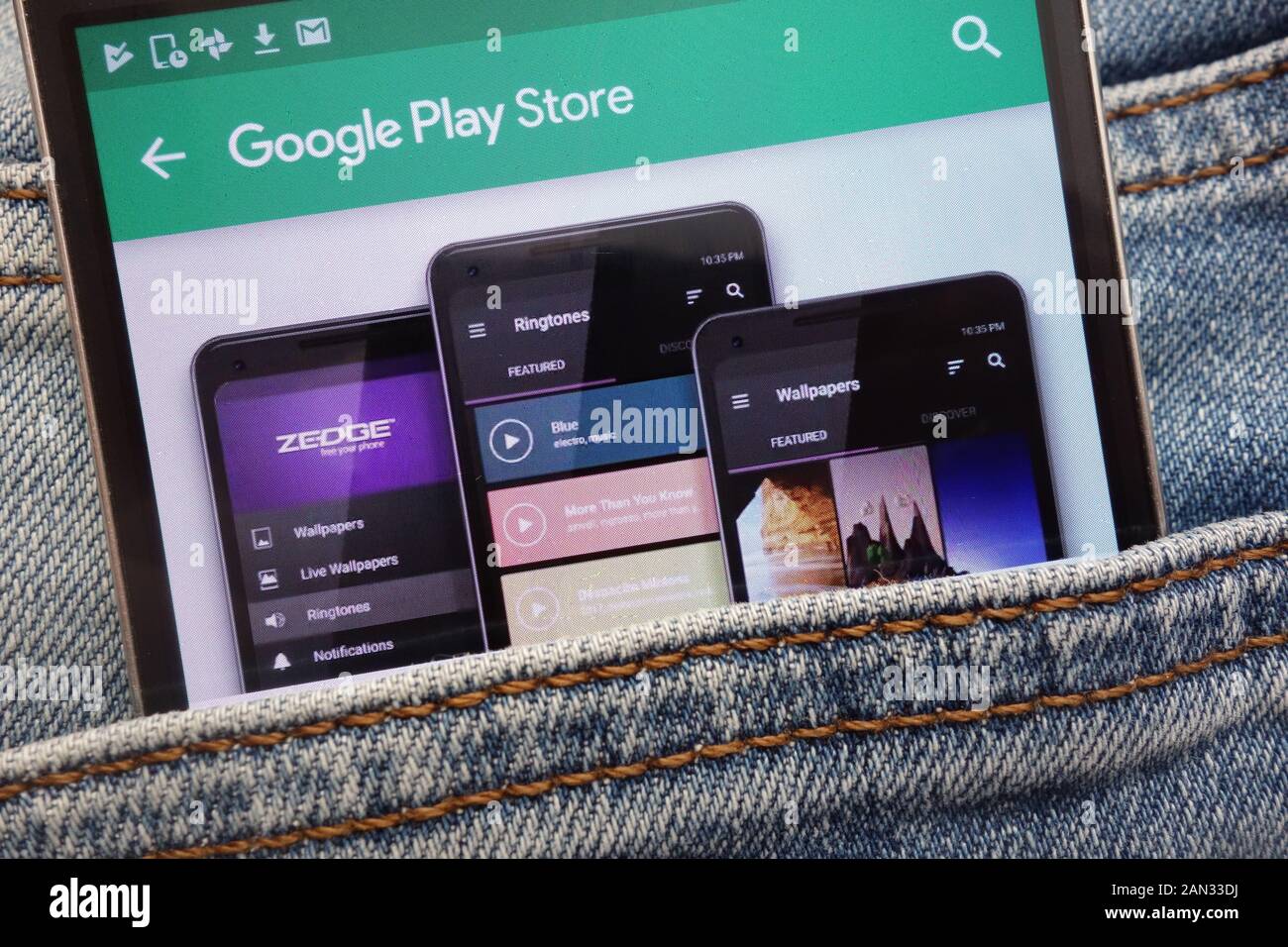 Zedge App bei Google Website spielen Store angezeigt auf dem Smartphone in Jeans Tasche versteckt Stockfoto