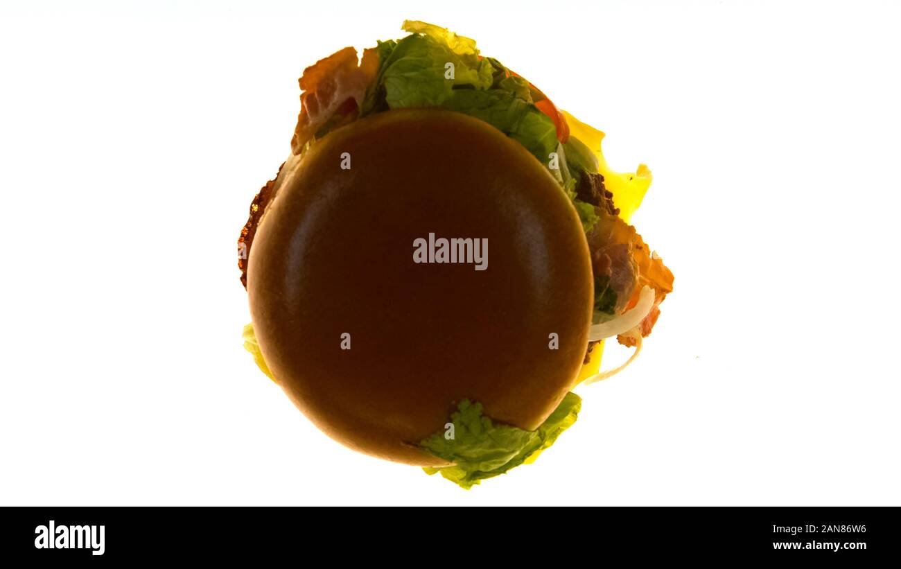 Verarbeitung Burger mit Beleuchtung, Junk food quality control, Ablaufdatum Stockfoto