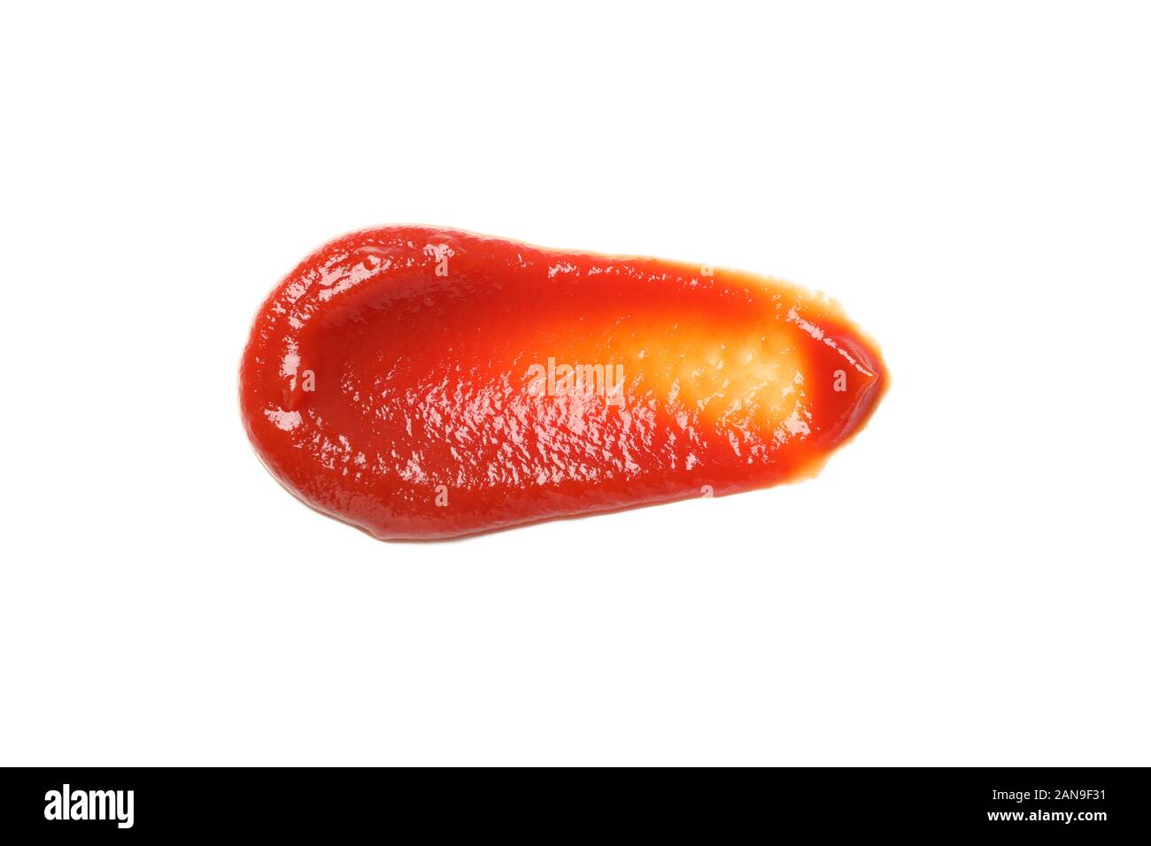 Ketchup Fleck auf weissem Hintergrund, Ansicht von oben Stockfoto