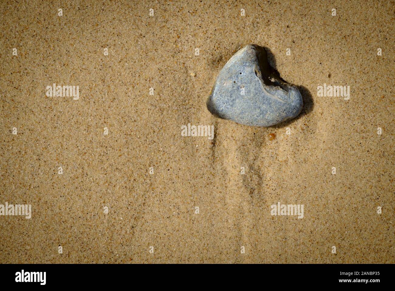 Kiesel am Strand Stockfoto