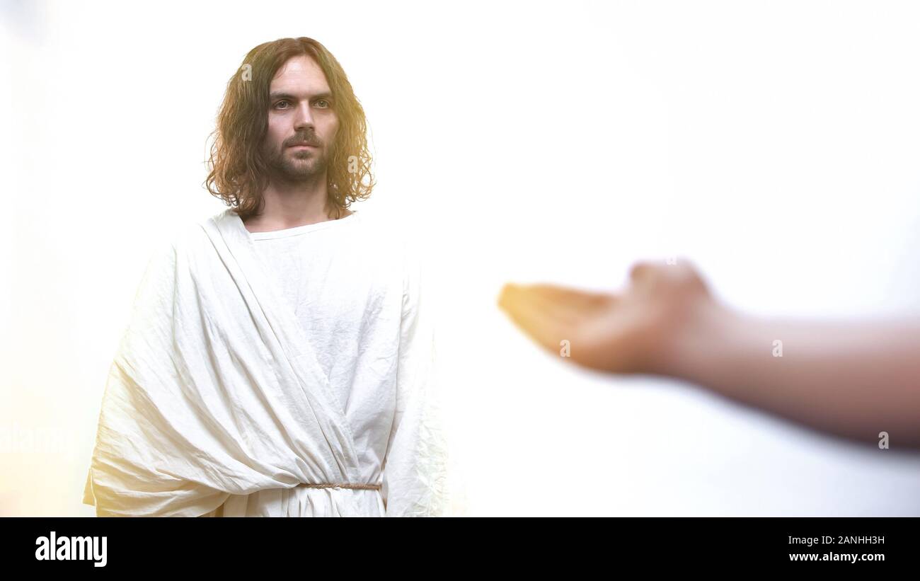 Männliche, Gott um Segen und Vergebung, Jesus stehen in heiliges Licht Stockfoto