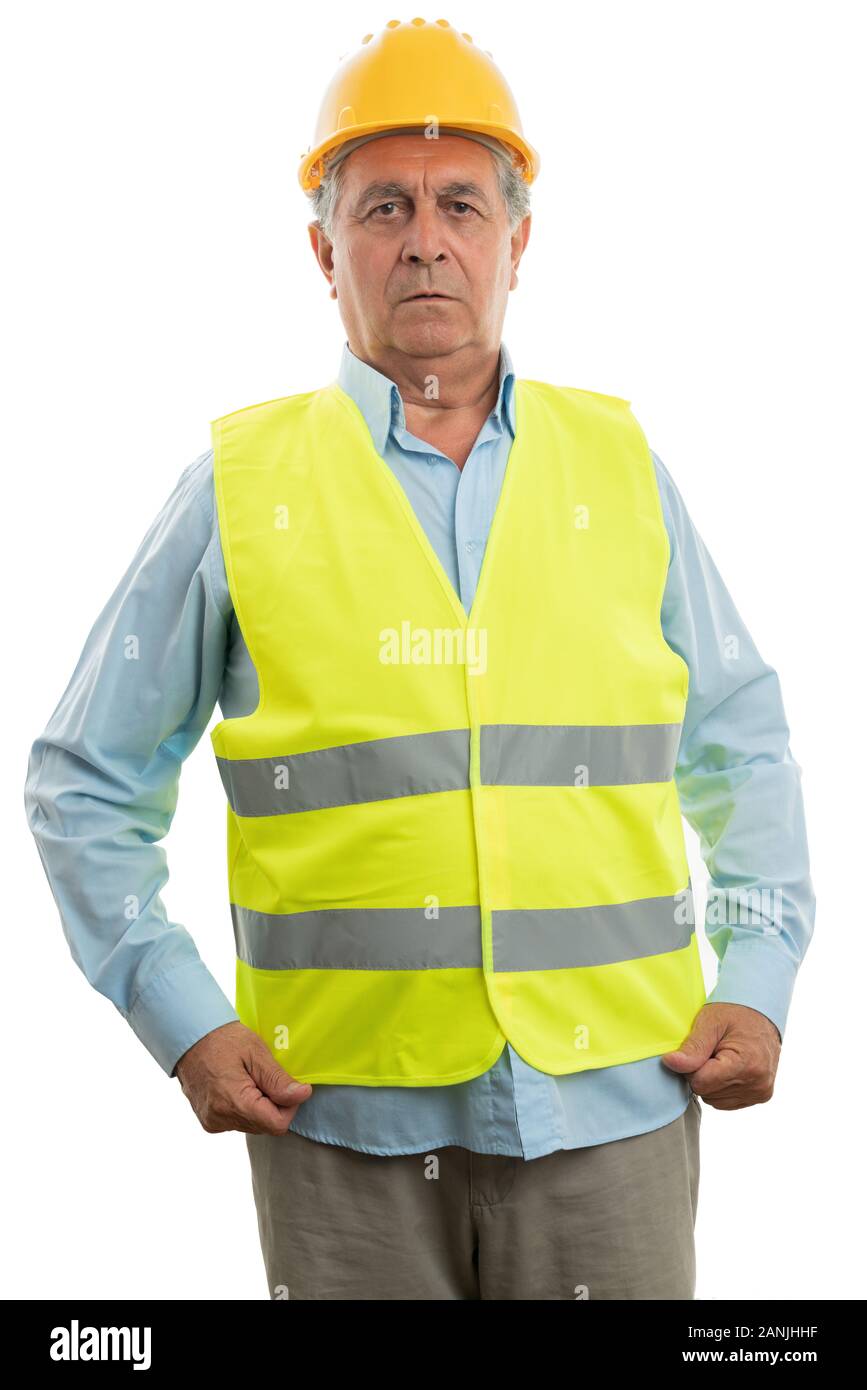 Alte Bauarbeiter tragen gelbe Helm Anordnen von fluoreszierenden Weste isoliert auf weißem Stockfoto