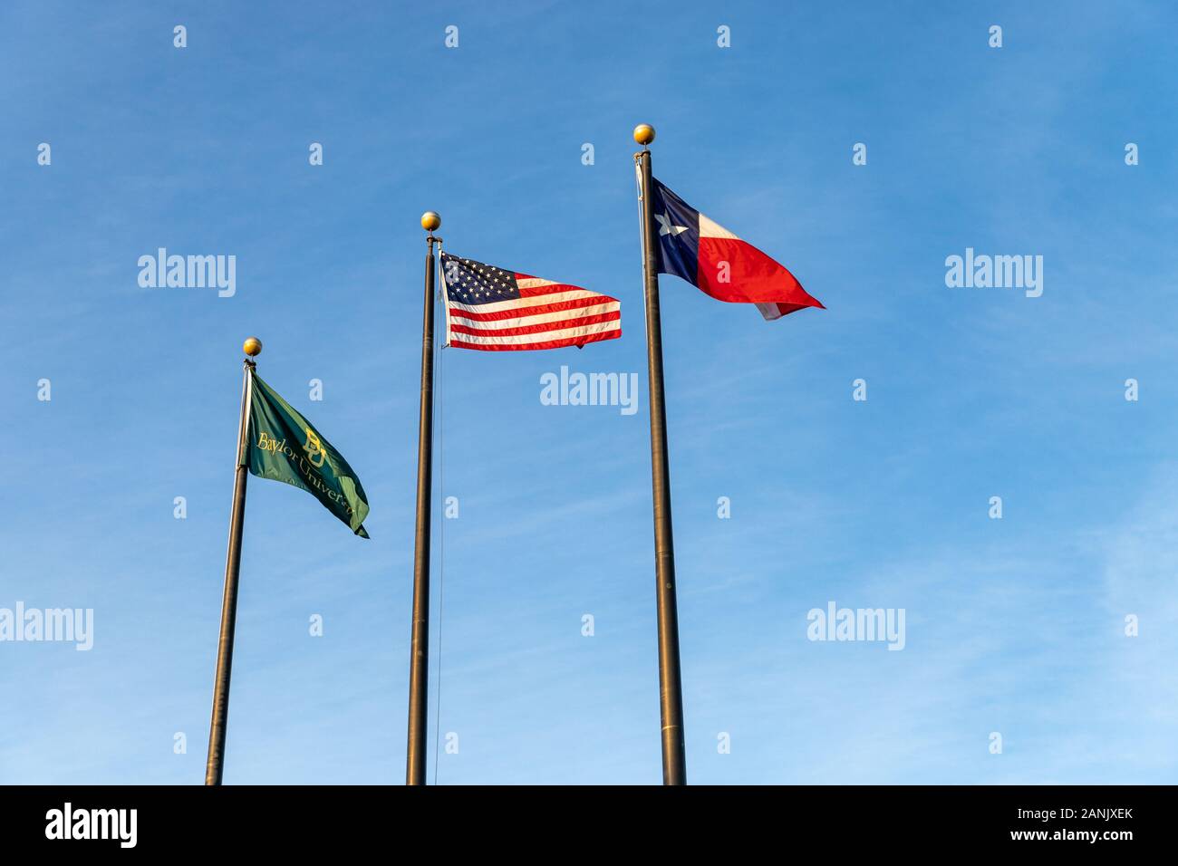 Der Baylor Universität Fahnen mit amerikanischer Flagge und der Texas State Flag Stockfoto