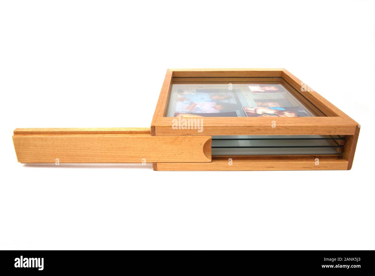 Holz Bilderrahmen mit Fotos - 3 Tiered Glas Stockfoto