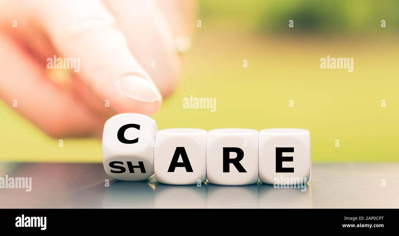 Würfel form Care die Worte '' und 'Teilen'. Stockfoto