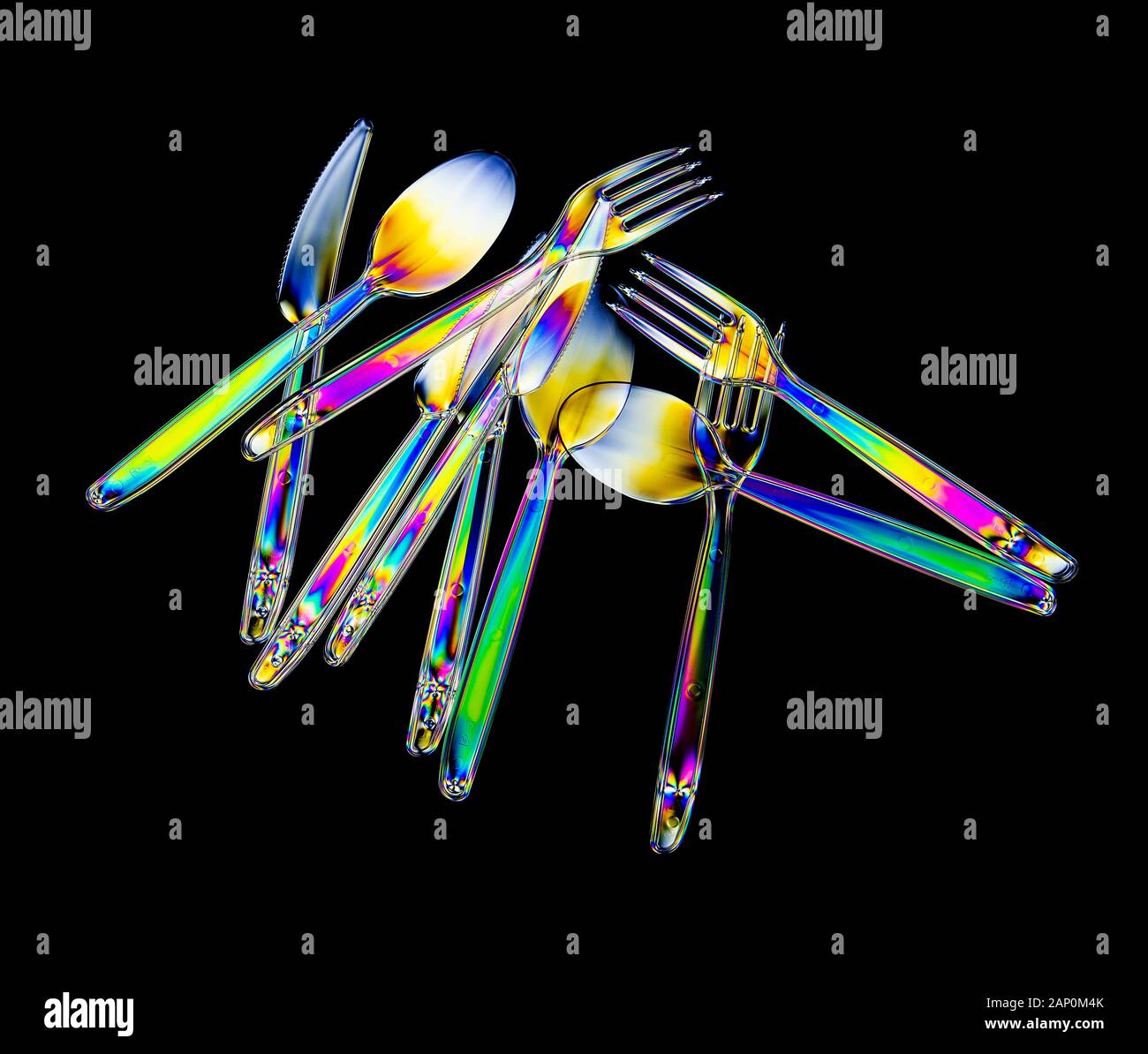 Bunte Belastungsmuster aus Hartplastik, die durch Bildgebung zwischen zwei gekreuzten Polarisationsfiltern aufgedeckt werden. Stockfoto