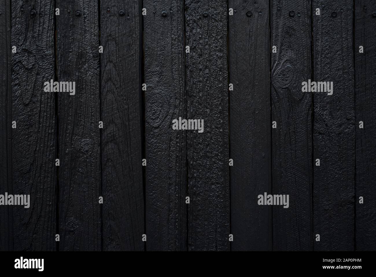 Schwarz lackiert Holzzaun, Holz Textur Hintergrund Stockfoto