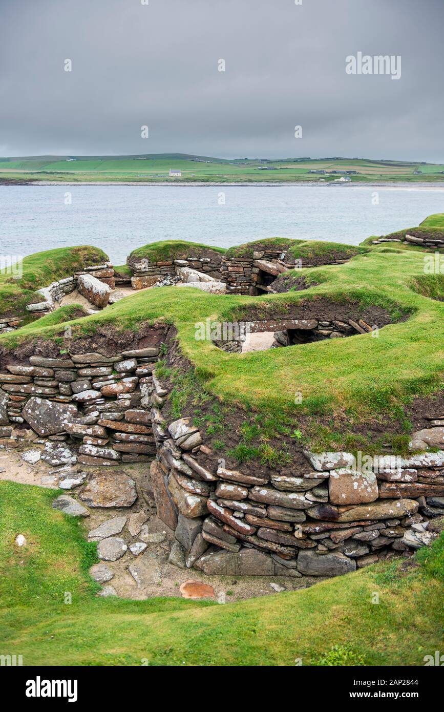 Skara Brae, ein Steinhaus neolithischen Dorf auf der Bucht Skaill an der Westküste von den Orkney-Inseln in Schottland. Stockfoto