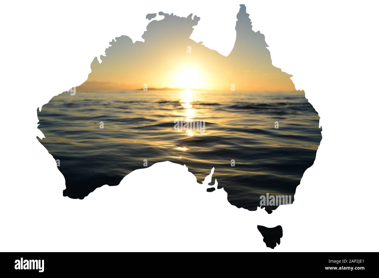 Ein warmer Sonnenaufgang auf dem Ozean in Victoria, einem Bundesstaat Australiens, der in eine Landkarte des Landes einging Stockfoto