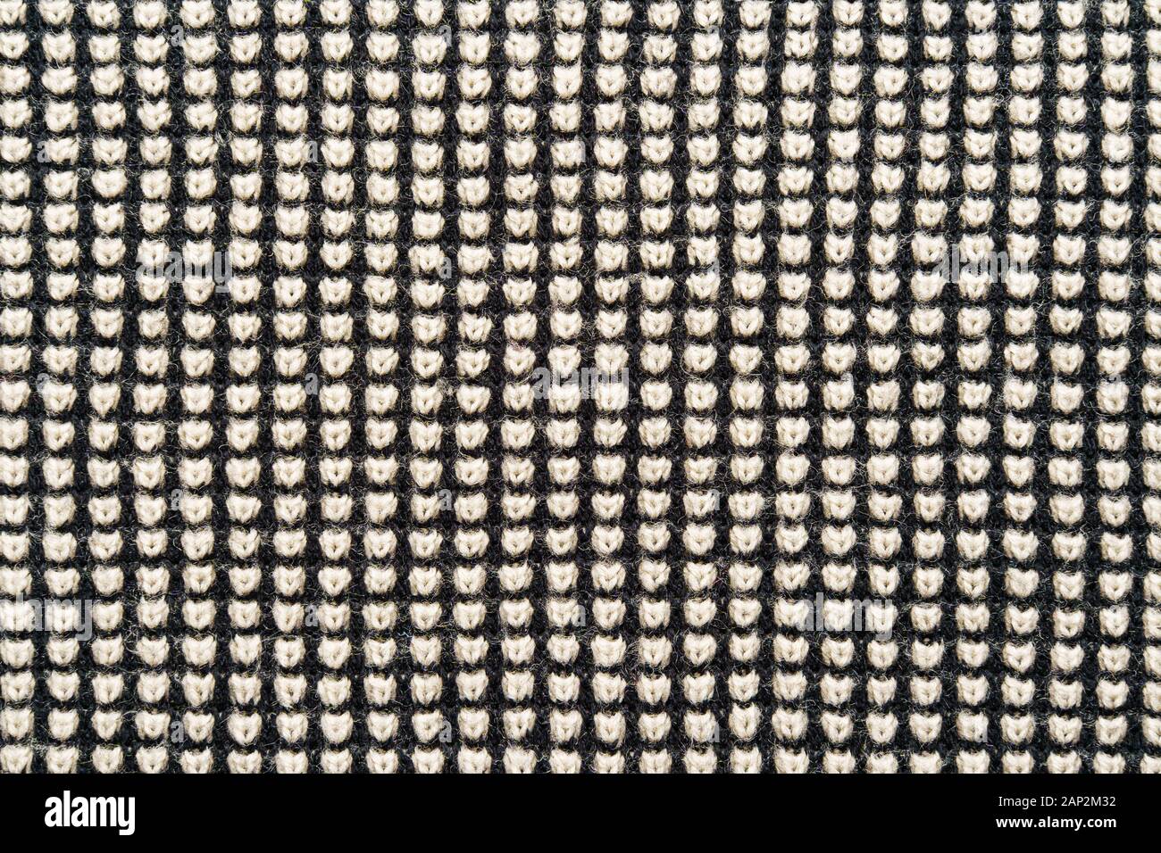 Grau stricken Textur. Bekleidung Hintergrund Stockfoto