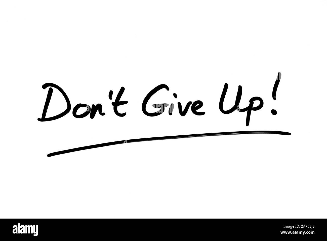 Geben Sie nicht auf! Handschriftlich auf einem weißen Hintergrund. Stockfoto