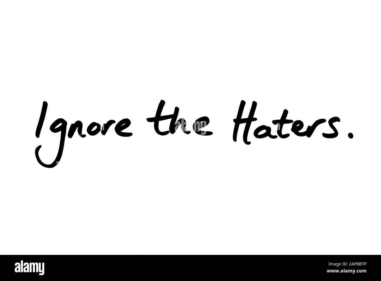 Ignorieren Sie die Hater handschriftlich auf einem weißen Hintergrund. Stockfoto