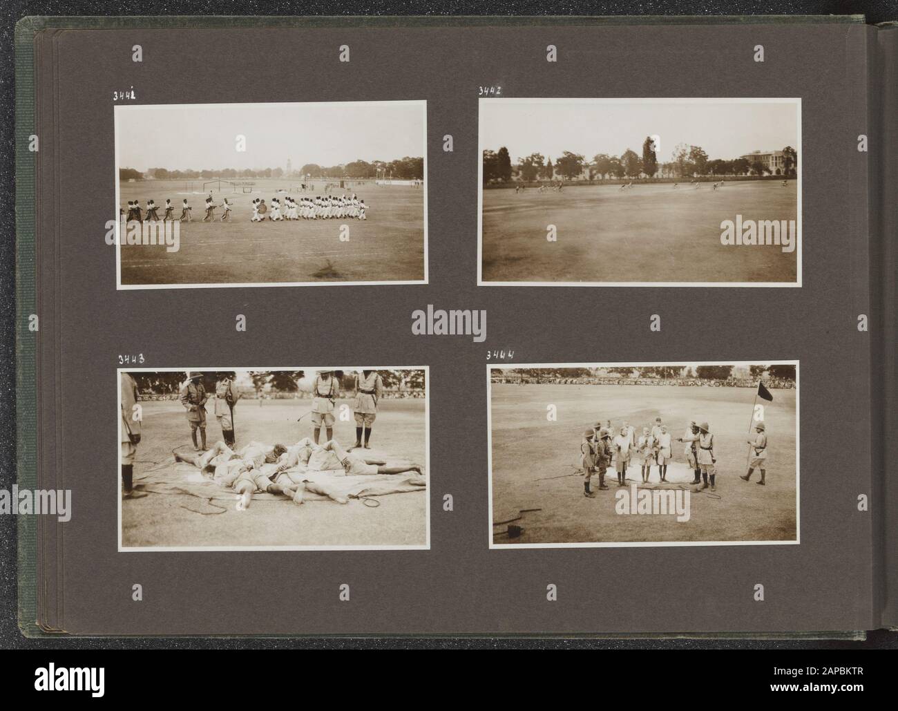 Fotoalbum Fisherman: British Indies, Nepal, z. (1932) Beschreibung: Album-Blatt mit vier Fotografien. Links oben: Parade der Athleten und eines Musikcorps. Oben rechts: Ein Radrennen. Unten links: Die Anzahl der Männer liegt auf den Magen auf einem Segel unter dem wachsamen Auge einer Reihe von Offizieren. Unten rechts: Die gleiche Situation, aber jetzt die lügenden Männer Datum: 1932 Ort: Nepal Schlagwörter: Musicorpsen, Sportwettkämpfe Stockfoto