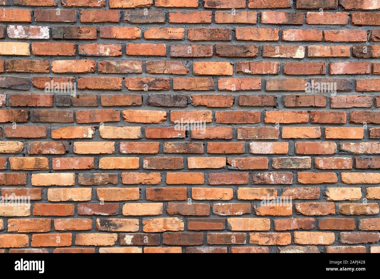 Ein gelber und roter Backstein Wand Vintage und Retro Stockfoto
