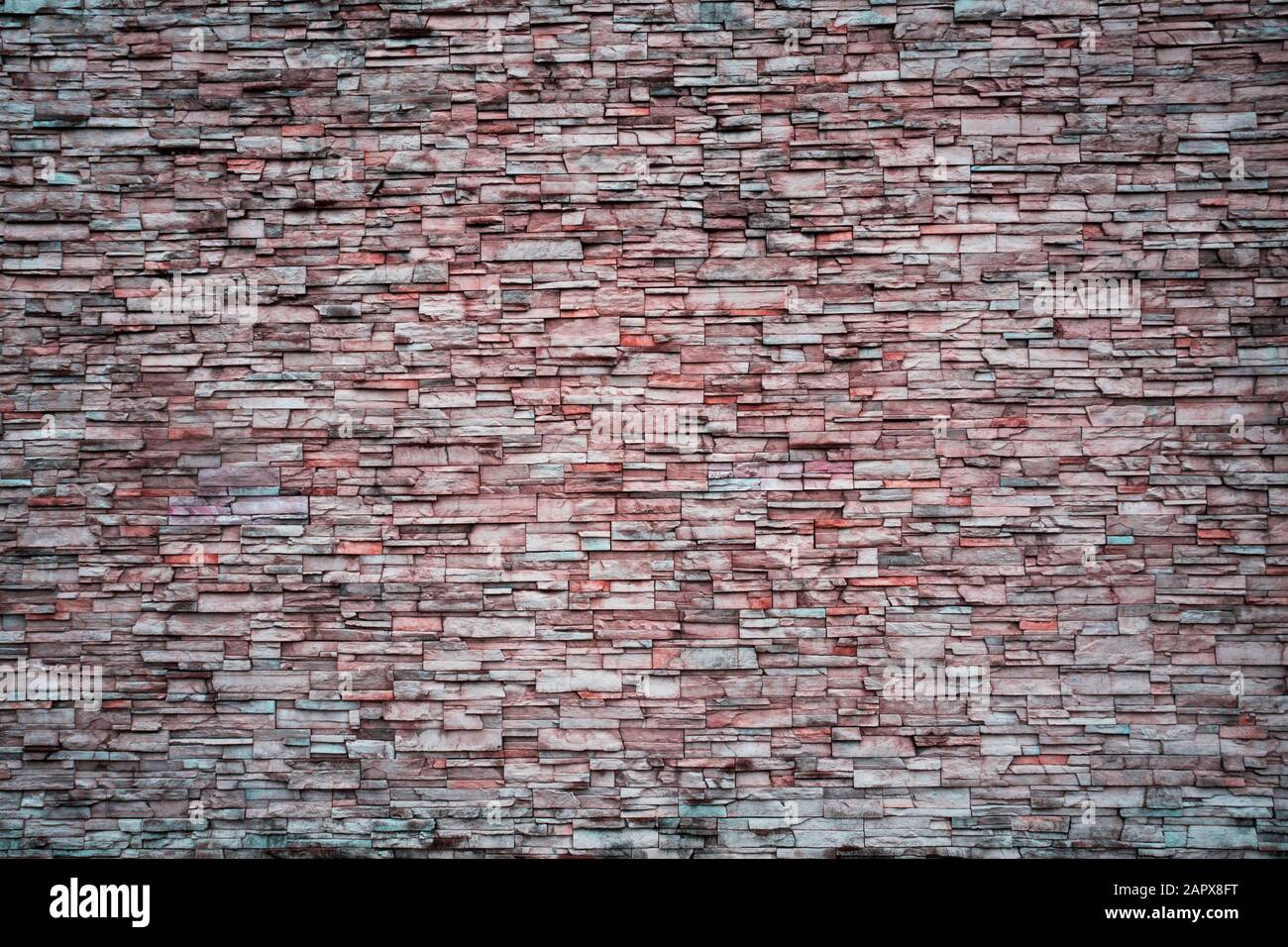 Abstrakte Muster der unregelmäßigen roten Farb-Brick-Wand als Hintergrund oder Texturen Stockfoto