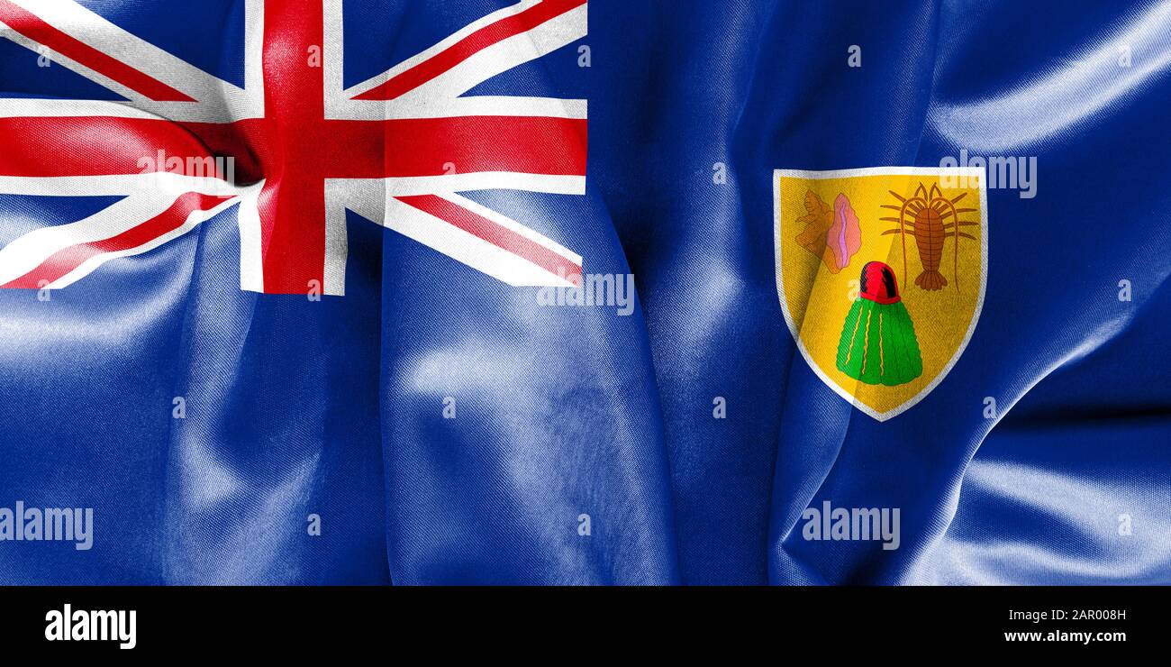 Turks- und Caicosinseln fahnen Textur, die mit Licht und Schatten zerknittert und zerknittert wird Stockfoto