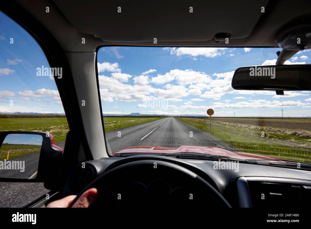 man driving along the ring road Hringvegur in southern iceland Stockfoto