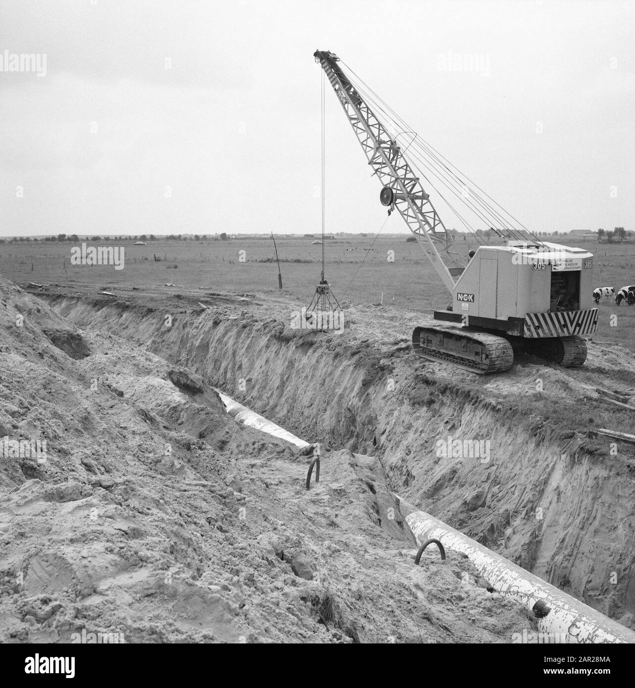 NPC, Pipelines, Slots, Maschinen, Greifer Datum: 1965 Schlagwörter: Greifer, Maschinen, npc, Pipelines, Slots Stockfoto