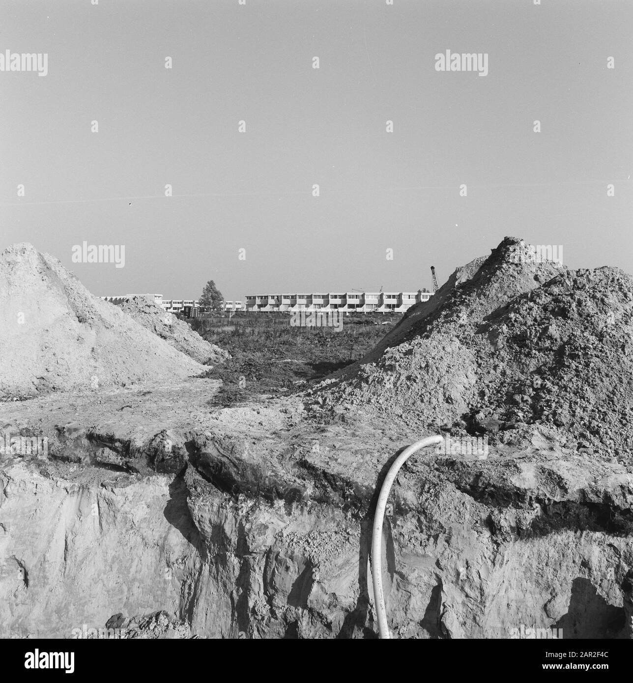 Werke, Schlaglöcher, Schlangen Datum: Undatierte Schlüsselwörter: Schlaglöcher, Schlangen, Arbeit Stockfoto