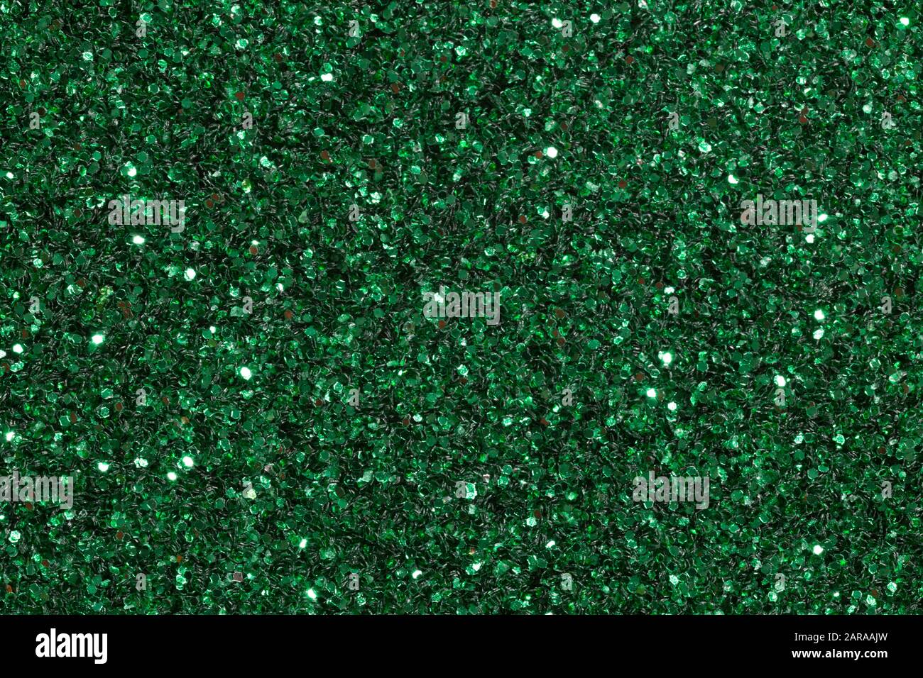 Festlicher, eleganter abstrakter Hintergrund mit grünen Lichtern aus Glitter. Stockfoto