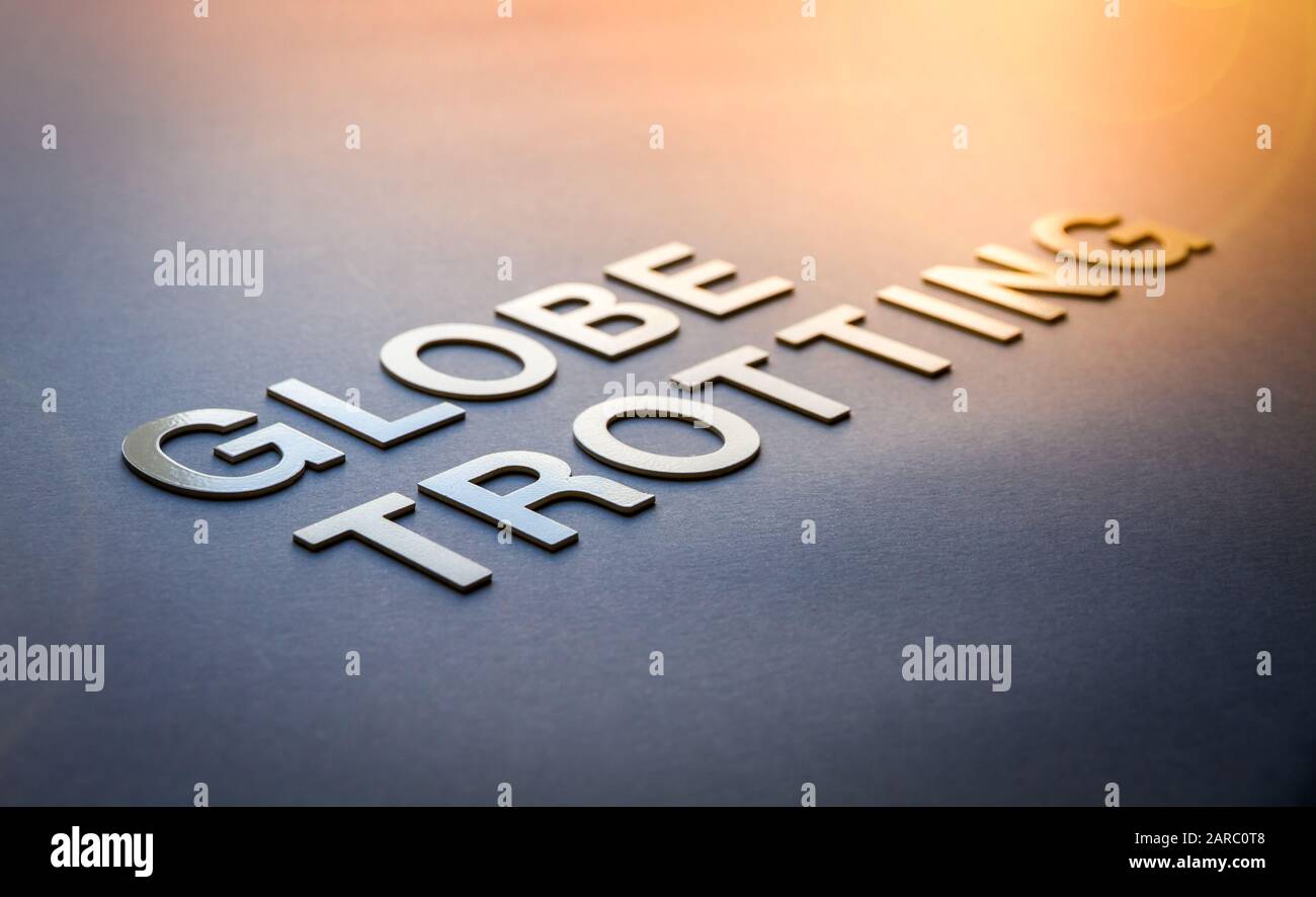 Wortglobus trottiert mit weißen, durchgezogenen Buchstaben auf einem Brett Stockfoto