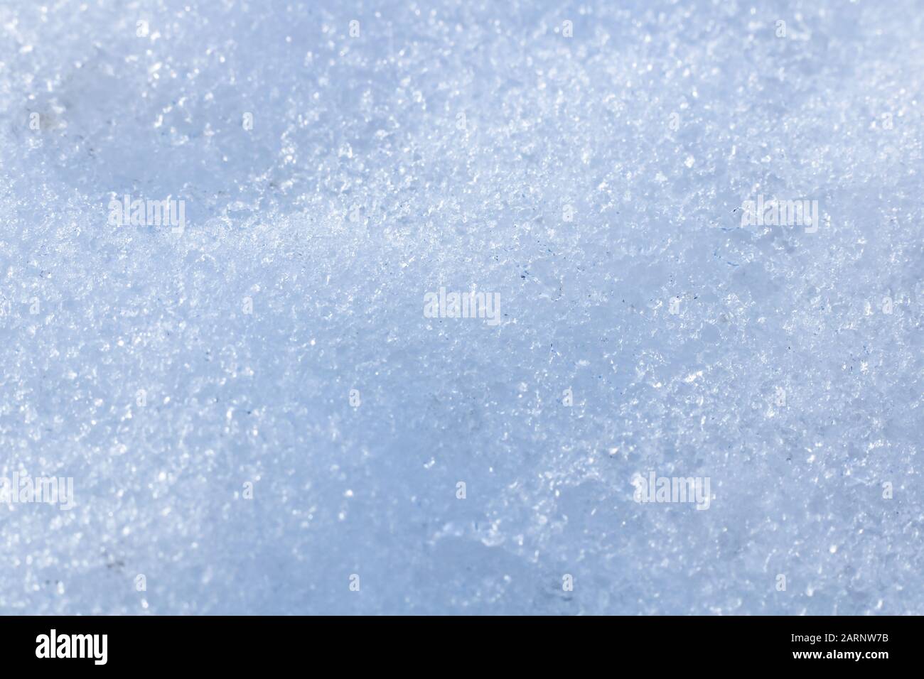 Schneehintergrund mit detaillierten Schneeflocken. Makrofoto von Schnee Stockfoto