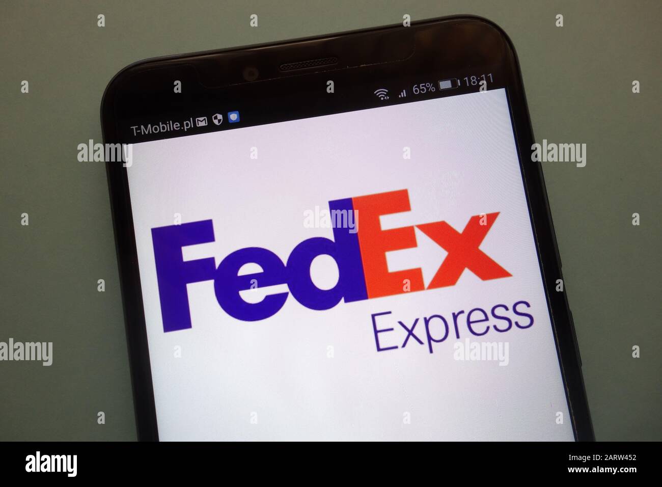 FedEx Express-Logo auf einem Smartphone Stockfoto