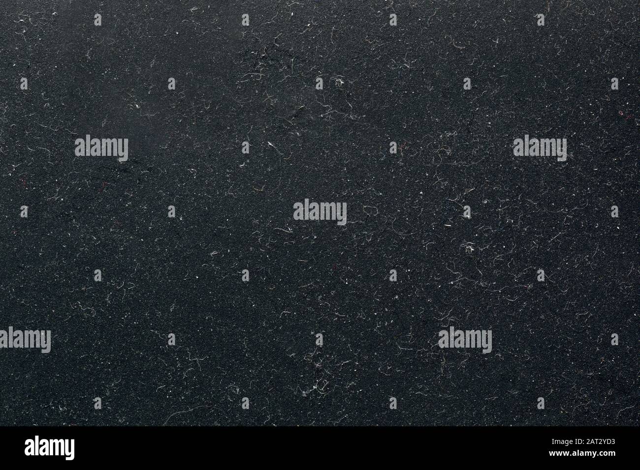 Extreme Nahaufnahme der Mit Staub und Haaren Bedeckten Kunststoffoberfläche Stockfoto