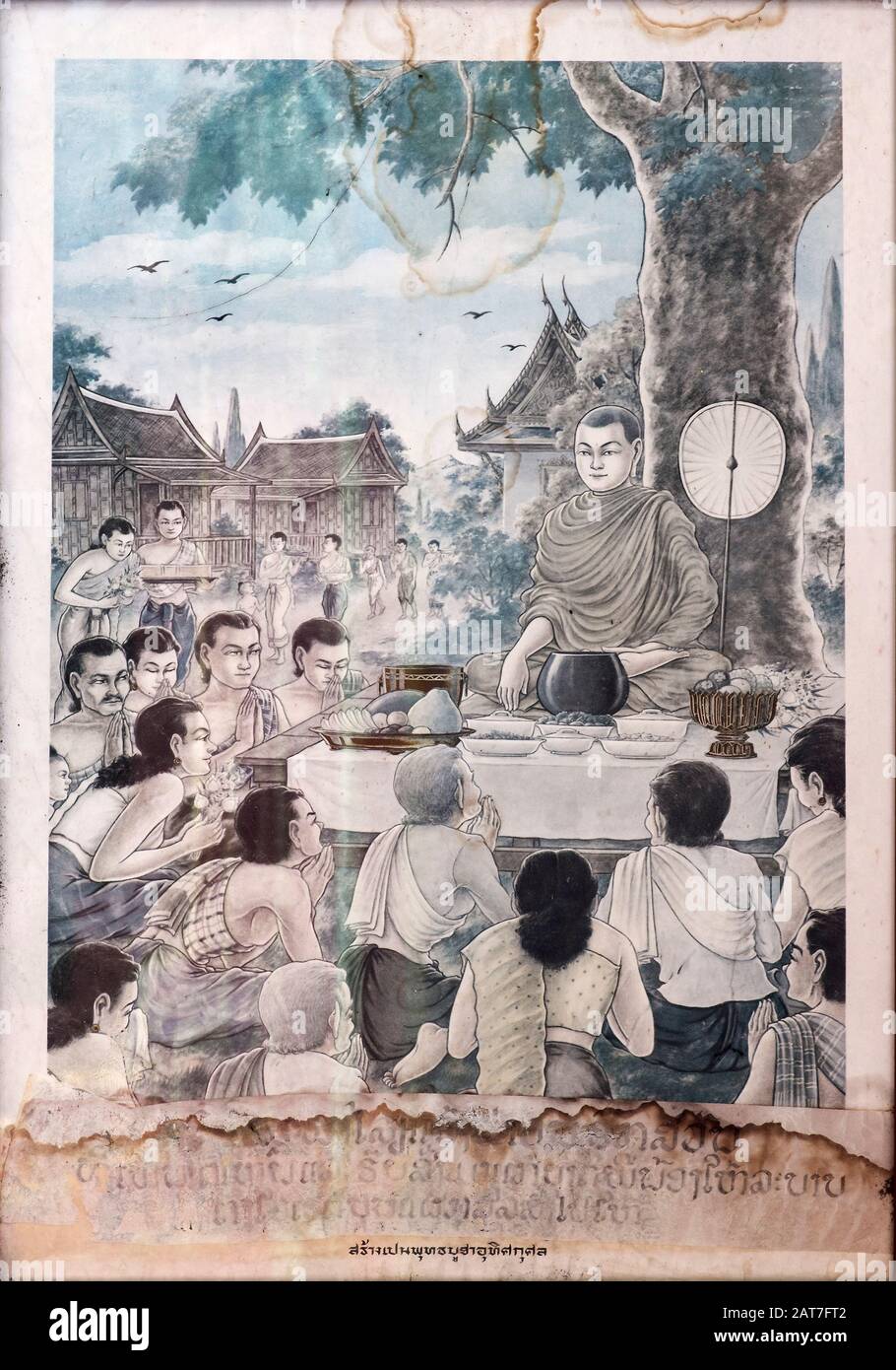 Aus dem Buch Phra Malaya zu ziehen, das einen Mönch, den Tempel Wat Sen Soukharam, Luang Prabang, Laos, verdient Macht Stockfoto