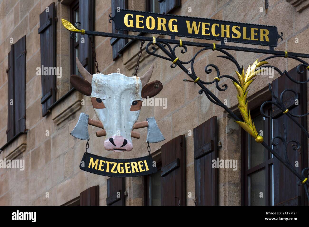 Nasenschild mit einem Kuhkopf einer Metzgerei, Spalt, Mittelfranken, Bayern, Deutschland Stockfoto