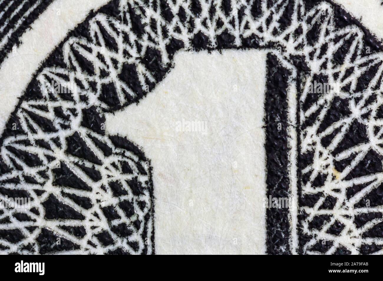 Makro-Nahaufnahme der Nummer eins auf der US-Dollar-Rechnung. Stockfoto