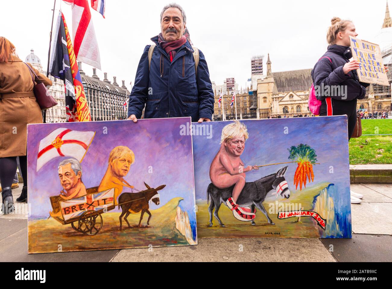 Kaya Mar Artist on Brexit Day, 31. Januar 2020, in London, Großbritannien mit satirischen Kunstwerken mit Boris Johnson und Nigel Farage Cartoon-Stil Stockfoto