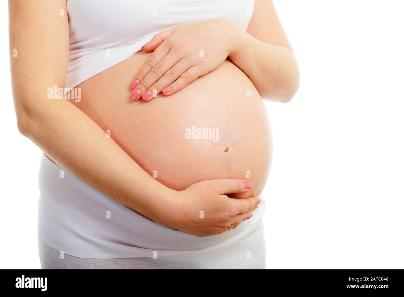 Eine niedliche schwangeren Bauch isoliert auf weiss Stockfoto