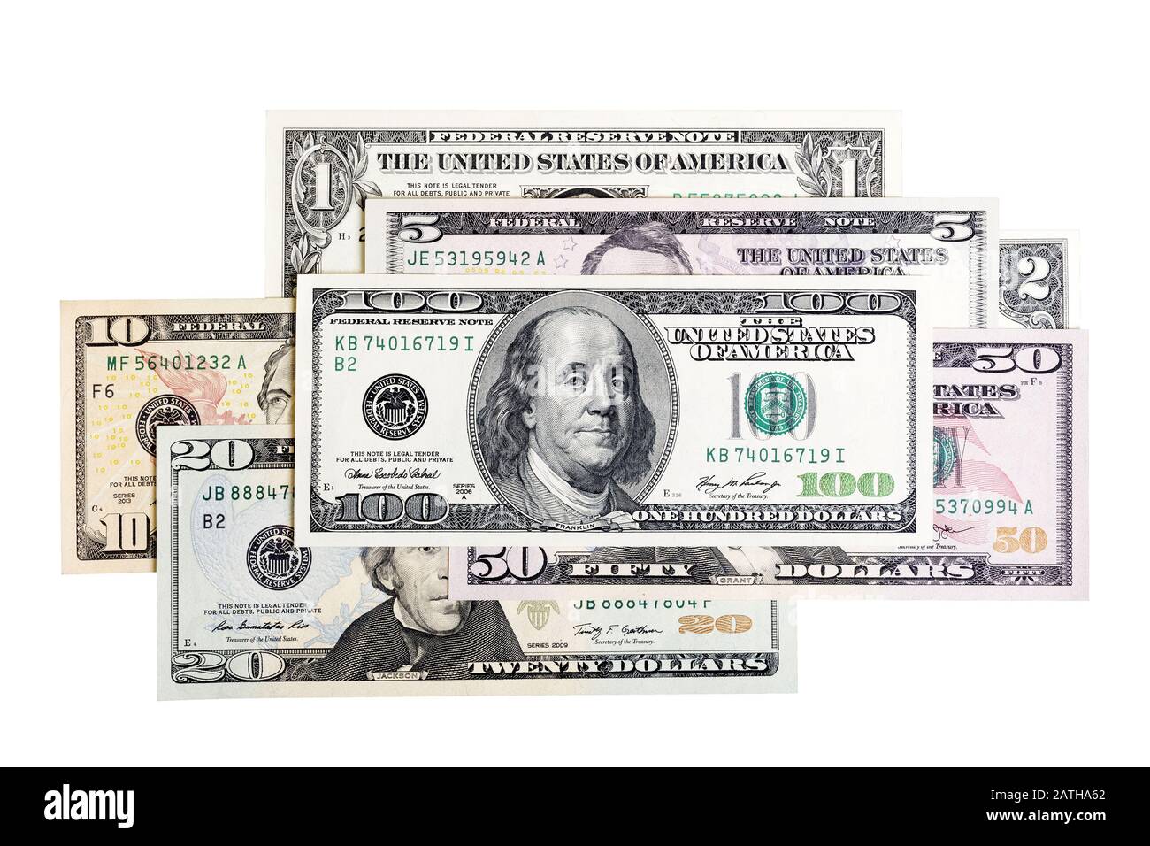 Verschiedene US-Dollar-Noten. Alles auf weißem Hintergrund. Stockfoto