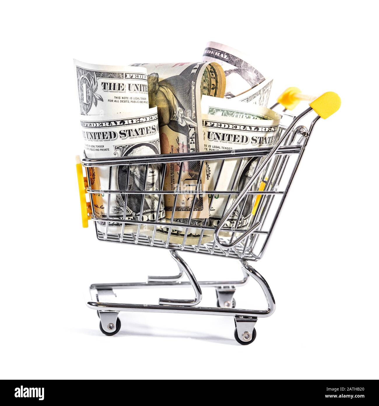 Warenkorb oder Einkaufswagen voll mit verschiedenen Dollarscheinen; , Konzept Online-Shopping oder finanziellen Erfolg Stockfoto