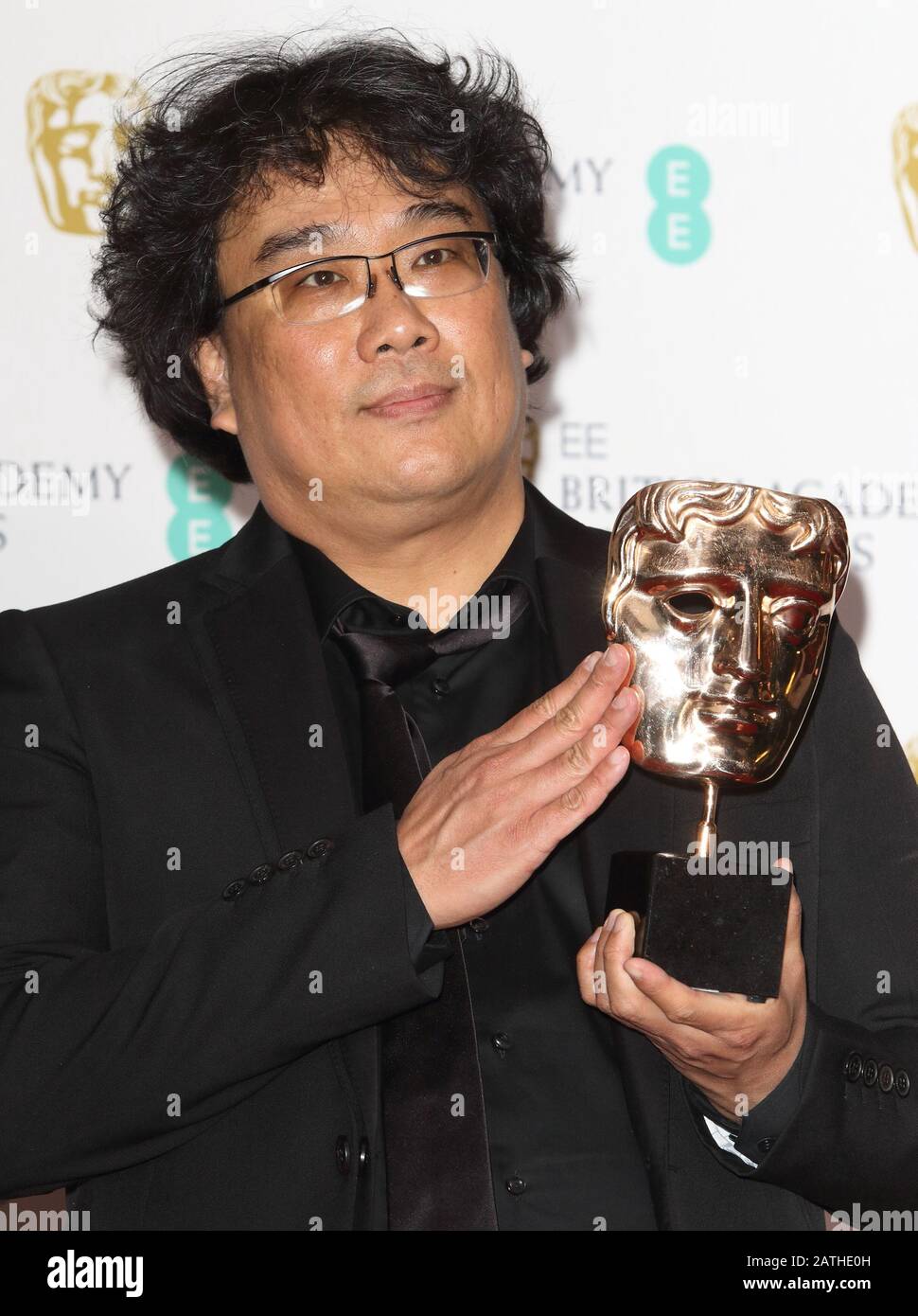 Bong Joon Ho - Bester fremdsprachiger Film für Parasiten während der BAFTA British Academy Film Awards - Siegerzimmer in der Royal Albert Hall. Stockfoto